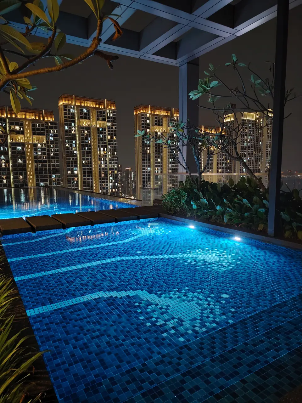 Infinity pool, lit at night
