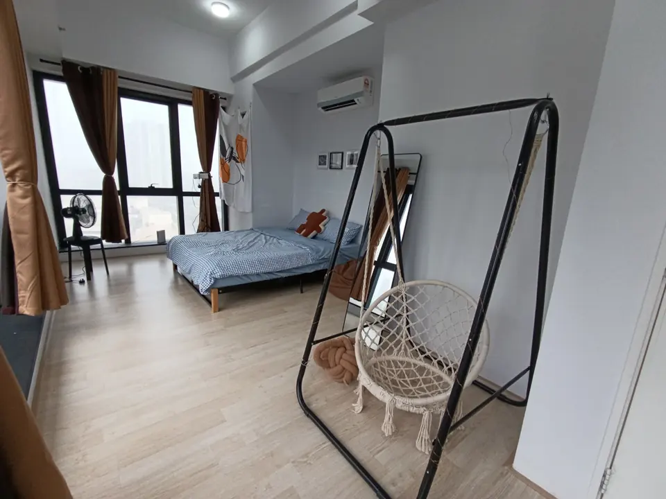 Swing chair by the window
